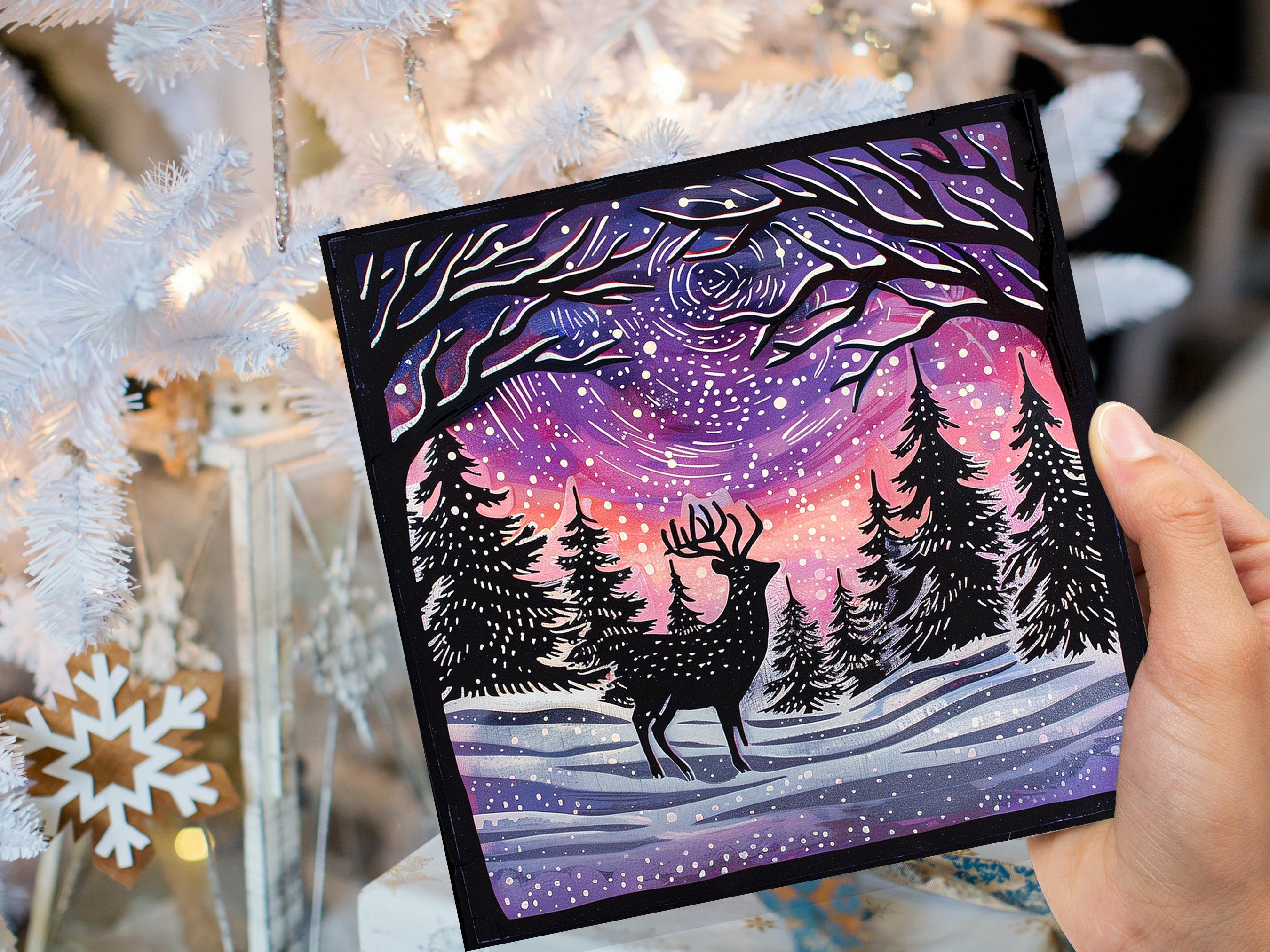 Christmas Card Reindeer Silhouette with Northern Lights Starry Sky Pine Tree Forest Aurora Borealis Deer Black Pink Orange Winter Sun Snow