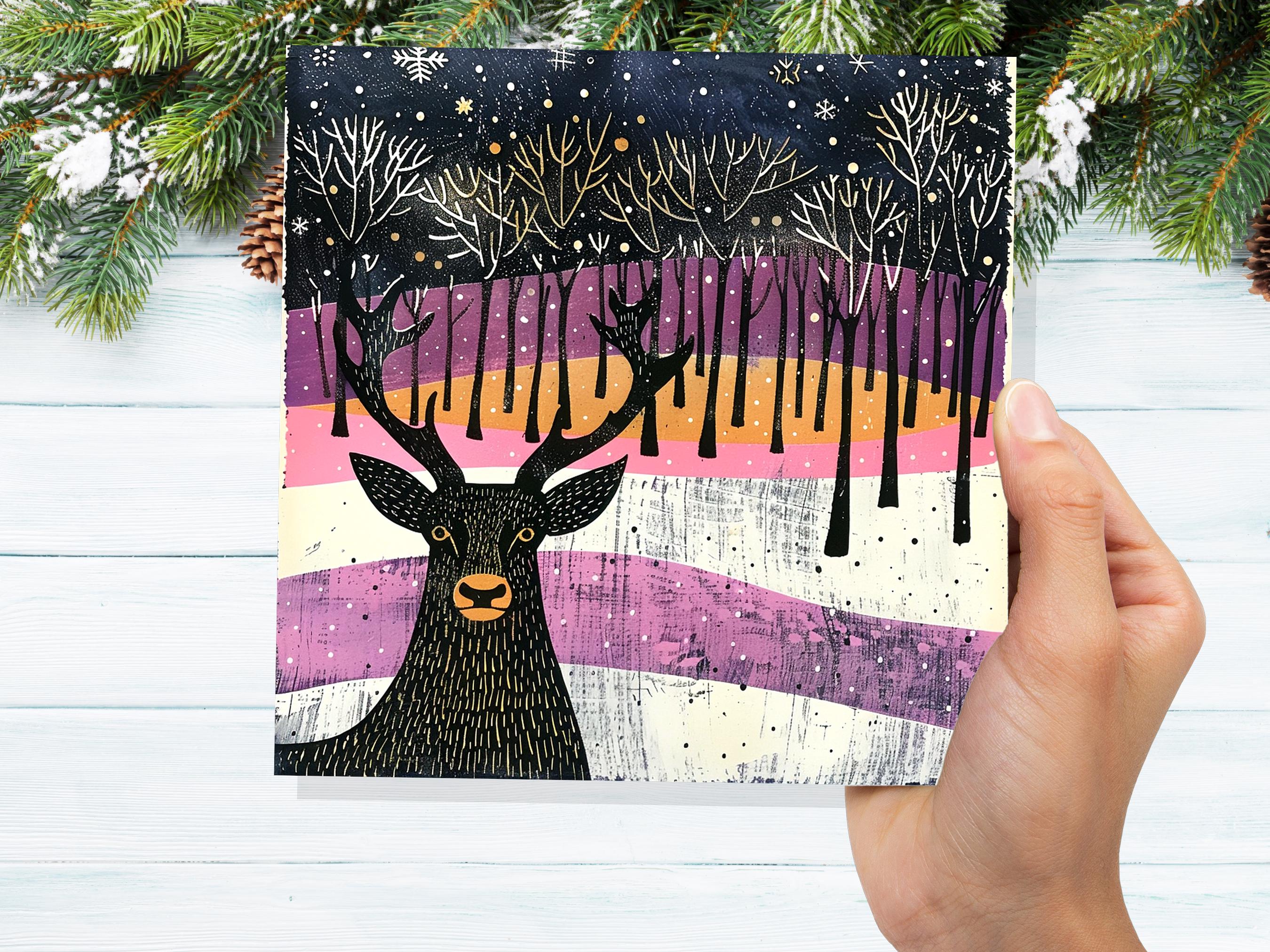 Scandinavian Linocut Deer Christmas Card Black Pink Orange Winter Forest Scene with Snowflakes Reindeer Woodland Art for Family Friends 2024 - View 3