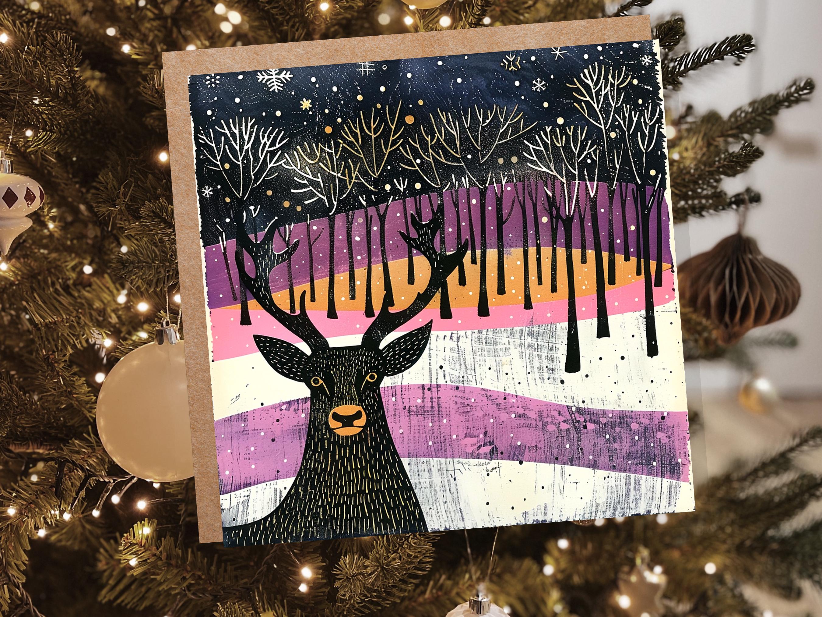 Scandinavian Linocut Deer Christmas Card Black Pink Orange Winter Forest Scene with Snowflakes Reindeer Woodland Art for Family Friends 2024 - View 4