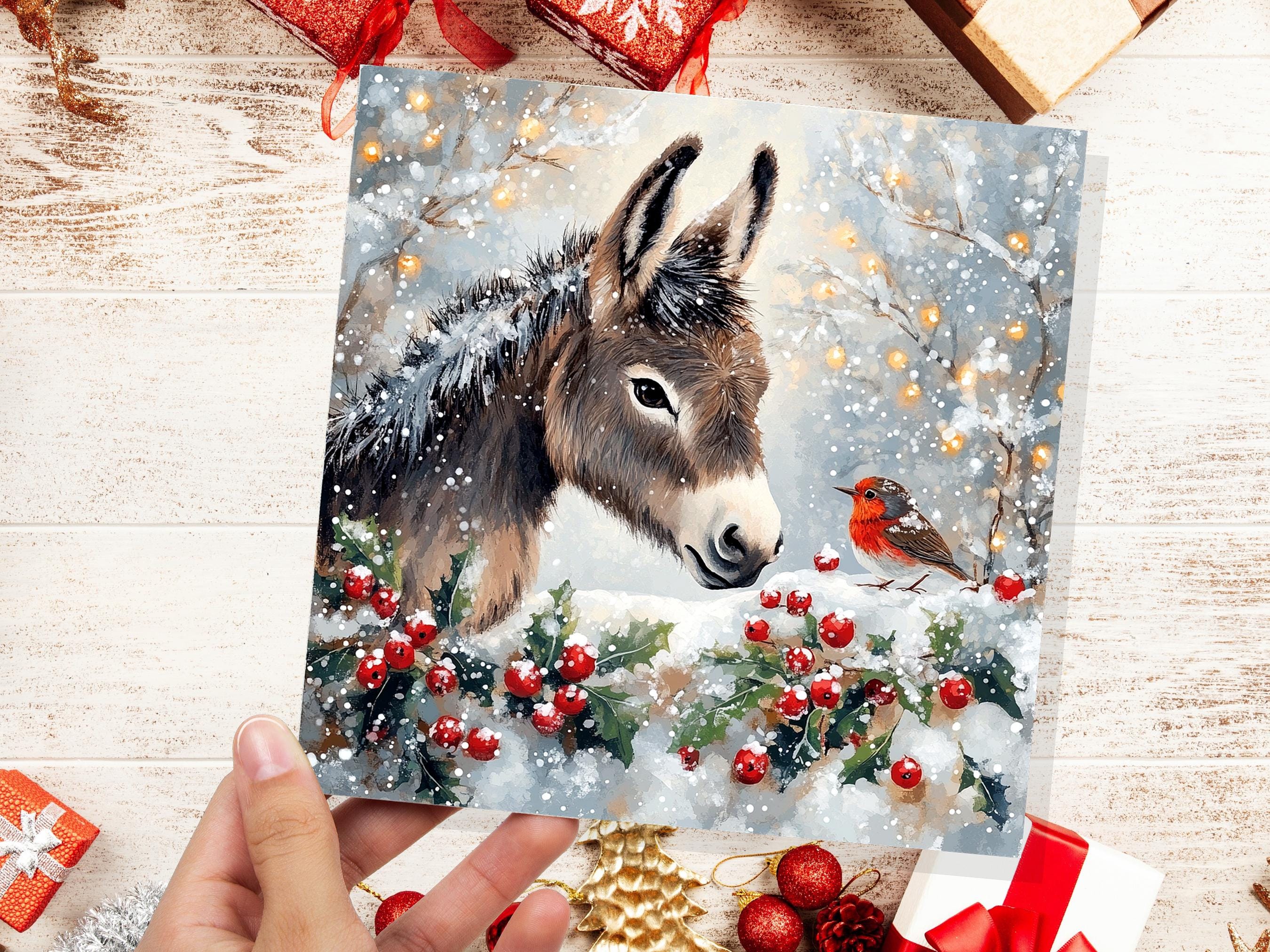 Christmas Card with Donkey and Robin Snow Scene Holly Berries Fairy Lights Festive Winter Landscape Xmas Greetings for Family Friends 2024